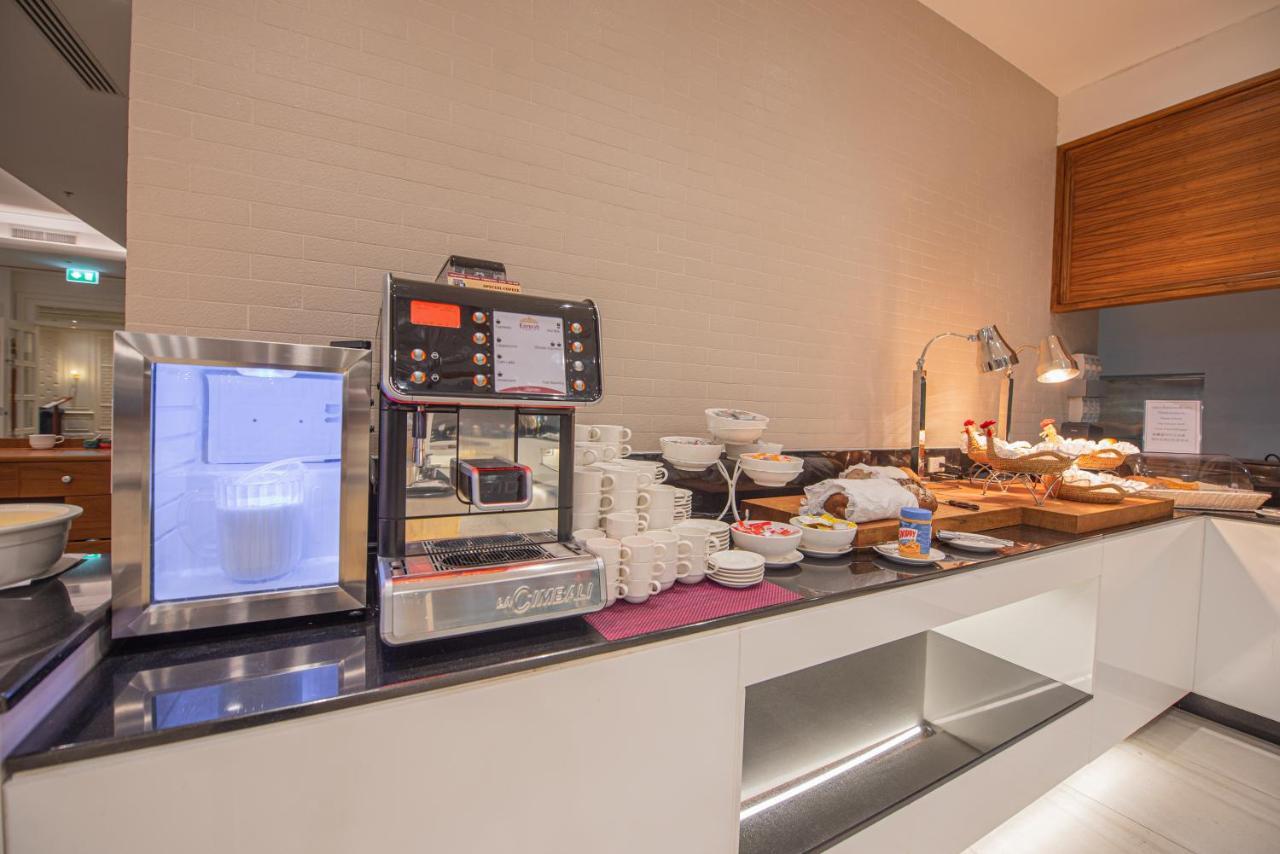 The Empress Premier Chiang Mai - Sha Extra Plus Εξωτερικό φωτογραφία A coffee machine in a hotel